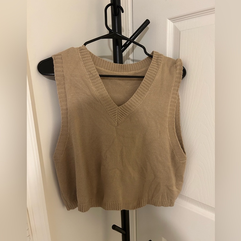 beige sweater vest